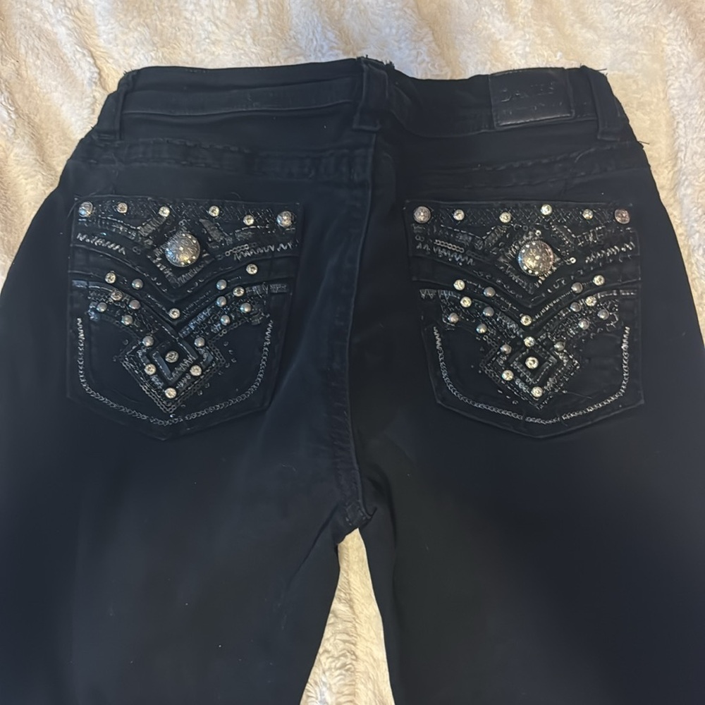Black bedazzled flare jeans